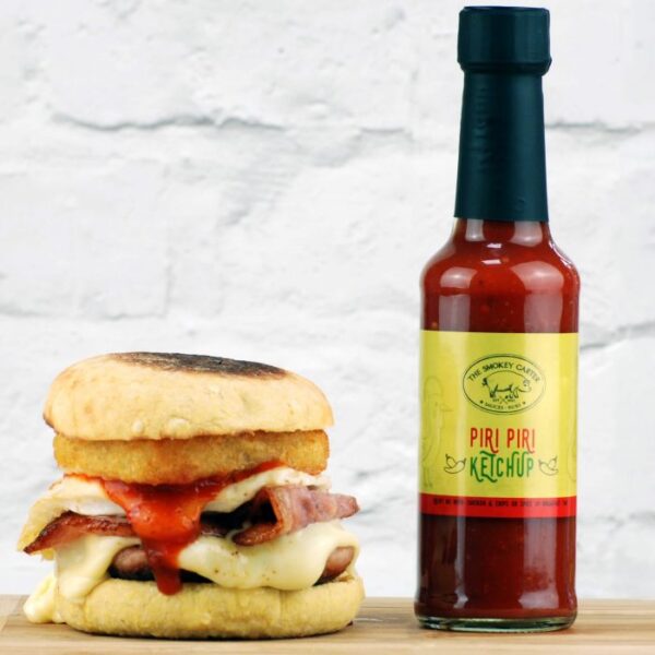 Pitmaster Piri Piri Ketchup - 1 x Piri Piri Ketchup 150ml Give it a try if you dare! This is ketchup with a kick. Made with Birdseye Chillies. Piri piri is a popular dish in Portugal. Use as you would ketchup! Great with chicken and chips or your English fry up. You can also mix with mayo and lemon Juice to make a great dip for wedges and chips. Ingredients: Tomatoes, sugar, red pepper, cider vinegar, garlic, birds eye chilli, lemon juice, lime juice, salt, smoked paprika, Portuguese oregano, cumin, glucose syrup, maize starch, acidity regulator (citric acid).