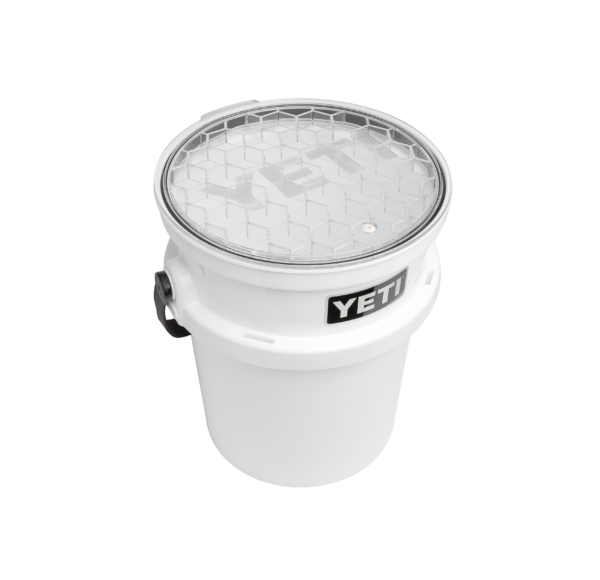 Yeti Loadout Bucket Lid - Yeti Loadout Bucket Lid The Loadout Lid keeps contents safe from salt spray and contained when the water gets rough. Taking inspiration from the Rambler family of lids, it's transparent, easy to remove and water-resistant. The HeftHex™ Construction makes for a more durable framework that resists cracking, even in extreme temps with up to 300lbs of pressure.  