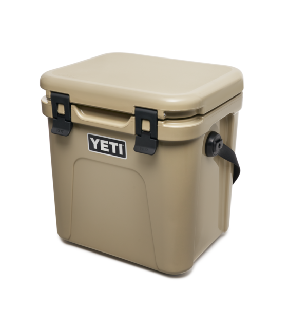 Yeti Roadie 24 - Tan - Yeti Roadie 24 - Tan The Roadie® 24 Hard Cooler is a fresh take on a tried-and-true YETI favourite. It’s 10% lighter weight, holds 20% more, and even performs 30% better thermally than its legendary predecessor. Plus, we built it tall enough to accommodate critical bottles of wine but slim enough to squeeze behind the driver’s or passenger’s seat of a car. Now that’s what we call a road trip buddy.