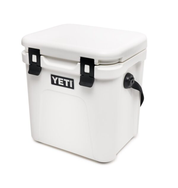Yeti Roadie 24 - White - Yeti Roadie 24 - White The Roadie® 24 Hard Cooler is a fresh take on a tried-and-true YETI favourite. It’s 10% lighter weight, holds 20% more, and even performs 30% better thermally than its legendary predecessor. Plus, we built it tall enough to accommodate critical bottles of wine but slim enough to squeeze behind the driver’s or passenger’s seat of a car. Now that’s what we call a road trip buddy.