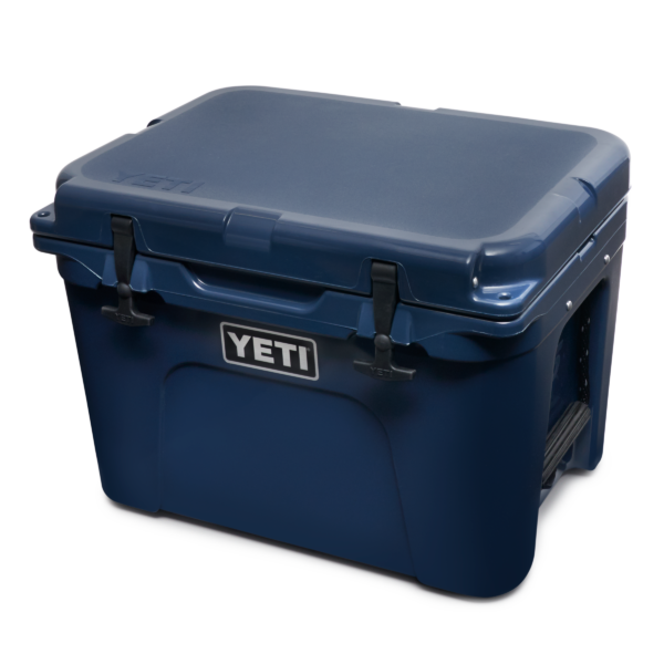 Yeti Tundra 35 - Navy - Yeti Tundra 35 - Navy The YETI Tundra® 35 is the right size for personal hauls or food for a small crew. It boasts up to three inches of PermaFrost™ Insulation and a rugged rotomolded construction for optimum adventure performance. Note: This Tundra cooler comes with one dry goods basket. - Empty Weight: 9.1kg