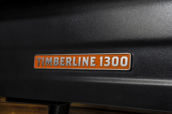 Traeger Timberline 1300 WiFi Pellet Grill - Traeger Timberline 1300 WiFi Pellet Grill – This top-shelf grill boasts three tiers of stainless steel grates that let you load up the grill with feast-worthy amounts of food. Fully insulated construction maintains steady temps in any weather for ultimate consistency. Plus, the included Traeger Pellet Sensor lets you monitor your pellet levels from anywhere using the Traeger App, so you never run out in the middle of a cook.   <strong>* Product available on backorder – Delivery within 2-3 weeks </strong>