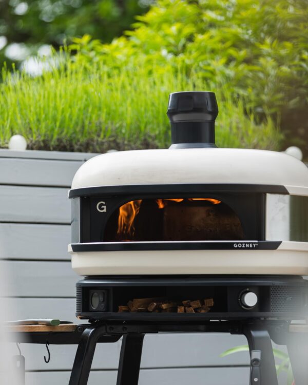 Gozney Dome & Stand - Dual Fuel - Bone - Gozney Dome & Stand - Dual Fuel - Bone Make wood-fired cooking easy with the Dome, the world’s most versatile outdoor oven. Enjoy a professional grade outdoor oven engineered to work effortlessly for beginners and exceptionally for chefs. Unrivalled performance. Unlimited possibilities. Made simple. Roast, smoke, steam or bake. Super fast or low and slow. A wood-fired adventure, every time, The Dome is the only investment you need to make in your garden.
