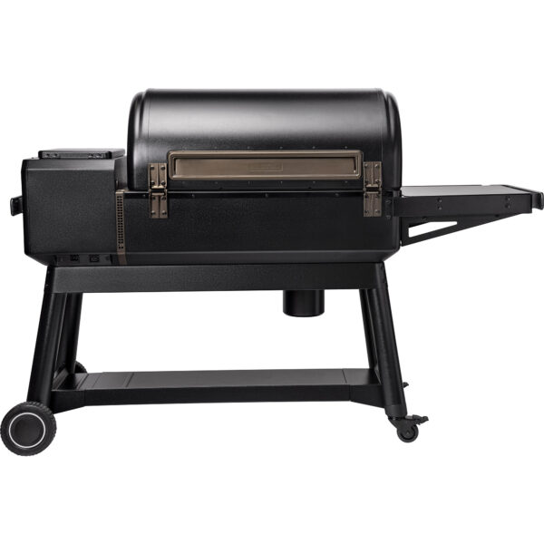 Traeger Ironwood XL Grill - Traeger Ironwood XL Grill Experience the evolution of wood-fired flavour with the all-new Traeger Ironwood® Wood Pellet Grill. You’ll discover next-level consistency in your cooks, unrivalled wood-fired flavour, and game-changing customization options that let you create the perfect grill for your cooking style.   New Smart Combustion™ technology and fully insulated construction help the Ironwood maintain incredibly precise temperatures, so you can cook with confidence knowing your results will be perfect every time. And since the Ironwood offers amazing versatility that lets you grill, smoke, bake, roast, braise, & BBQ all on one grill, the possibilities are truly endless. From slow-smoked brisket to glorious roasts, epic game day snacks, and decadent desserts, you can enhance any dish with incredible wood-fired flavour.   WiFIRE® technology lets you command your grill and monitor your cooks from anywhere for next-level convenience. And that’s not the only convenient thing about the Ironwood— super-simple clean-up means post-cook cleaning is as effortless as the main event. Plus, the new P.A.L. Pop-And-Lock™ accessory rail, ModiFIRE™ cooking surfaces, and Traeger Induction Cooktop (sold separately) allow you truly customize your grill setup and make it your own. If you’re ready to elevate the way you cook, the Ironwood is waiting.  