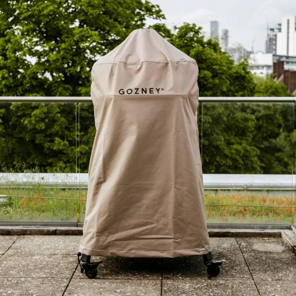 Gozney Full Length Dome Cover - Gozney Full Length Dome Cover Rain, snow, wind, sleet, hail, sunlight, anything. Protect your oven + stand all year round, with the 100% weather-proof full length Dome Cover. Heavy-duty fabric covers the full length of the Dome and stand. Gusset design to allow installation even when the Dome Mantel is fitted. Strong and simple toggle retention straps to batten down the hatches when the storm rolls in.