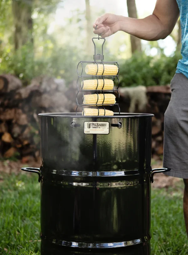 Pit Barrel Corn Hanger - Pit Barrel Corn Hanger What is BBQ without a grilled buttery corncob? It’s never been easier to cook corn alongside your choice(s) of meat! The Corn Hanger allows you to grill 4 cobs of corn without taking up too much space. The special rotatable swivel-head design and adjustable width allows for incredible flexibility to maximize the capacity of the Pit Barrel<sup>®</sup>.
